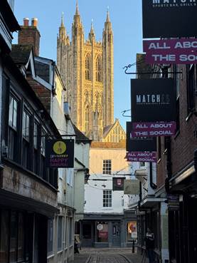 A building with a tall tower AI-generated content may be incorrect.