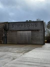 A building with a door  AI-generated content may be incorrect.