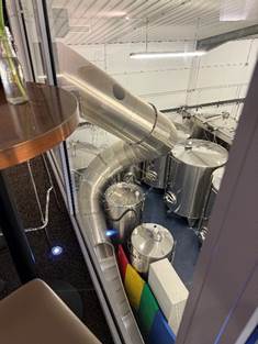A view from the window of a factory AI-generated content may be incorrect.
